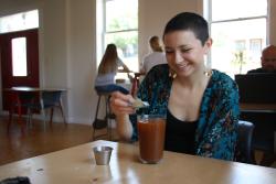 Customer Enjoying a Drink at Sucrose Bakery In St. Charles, MO