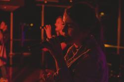girl singing inside
