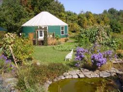 Climbing Vine Cottage—An elegant, ecologically friendly yurt that sleeps six, set on 18 acres amid a lush discovery garden.