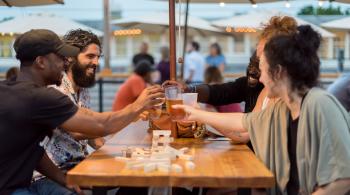 Friends at Millworks Rooftop Biergarden