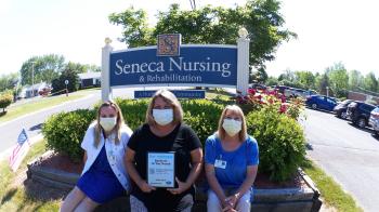 Seneca Nursing Home Business of the Month Employees by Sign