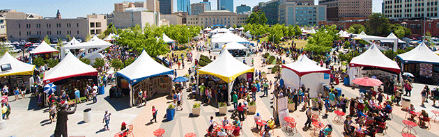 Festival of the Arts tents in front of city buildings