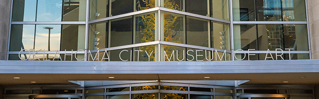 Oklahoma City Museum of Art entrance featuring entry sign and Dale Chihuly Glass exhibit