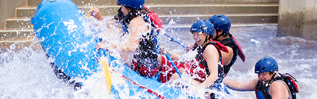 Group whitewater rafting at OKC'S RIVERSPORT Rapids attraction
