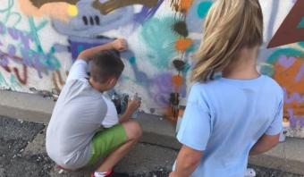 Rensselaer Public Art Walk - kids spray painting