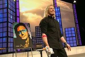 Erik Wahl shows off his artistic skills at a recent conference (© 2013 Collinson Media & Events)