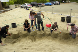 The piles of sand begin to take shape
