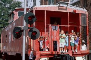 Wilmington, North Carolina railroad museum caboose with kids aboard