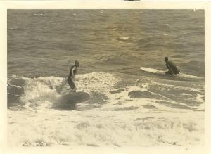 1966 Carolina Beach, NC, Joseph Skipper Funderburg surfing, Sonny Danner paddling, Funderburg