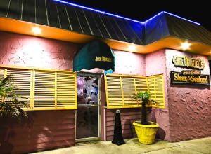 Exterior shot of Jack Mackerel's Restaurant at night