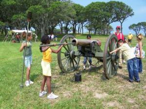 Kids with Fort Fisher cannon