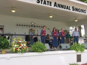 A group of singers on stage at the Benson Singing Convention, held annually in Benson, NC.