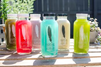 Vibrantly colored bottles of organic juice from Native Cold Pressed