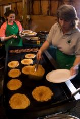 Pancakes being prepared at Mapleland Farms in Salem, N.Y. This month New York is offering a sweet and sticky treat for visitors as 110 of its maple producers, including Mapleland Farms, join together for the 16th Annual Maple Weekend (http://www.mapleweekend.com/). Credit: Darren McGee, NYS Dept. of Economic Development