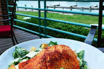 Salmon plate with lakefront view at Port City Club