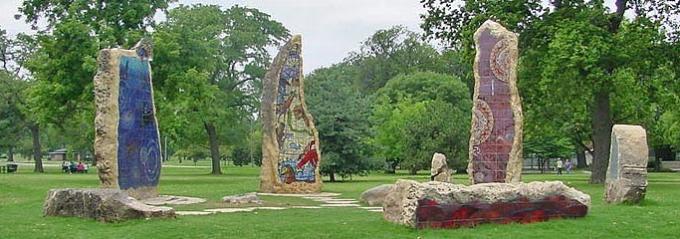 Several large stones are configured in a way to track the sun's location, similarly to Stonehenge. The stones have mosaic artwork on the faces in various colors.