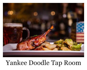 a steak with veggies and a beer from Yankee Doodle Tap Room