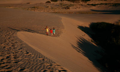 Family Walking Sand Trail at Jockeys Ridge State Park