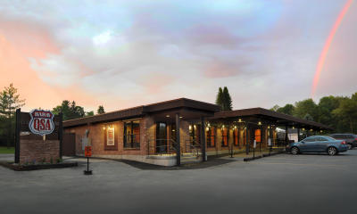 Exterior shot of PJ's BAR-B-QSA during sunset