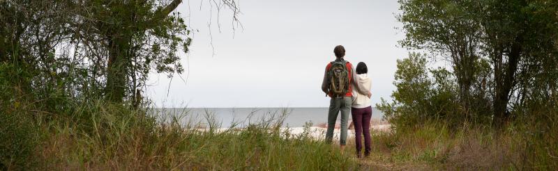 Couple hiking on island