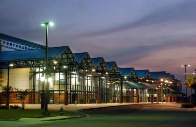 The well-lit entrance to Pontchartrain Convention & Civic Center in Jefferson Parish.