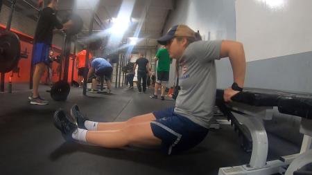 CrossFit athlete strengthening the upper body.
