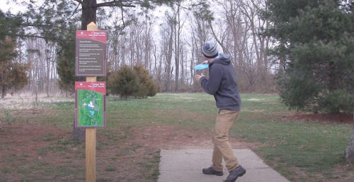 Man Playing Disk Golf At Indian Riffle Park In Kettering, OH