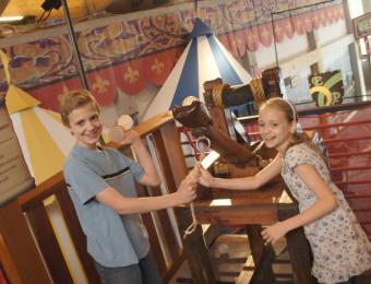 Kids rule the catapult at Exploration Places' Renaissance castle