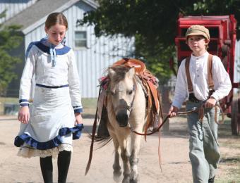 Children with a horse
