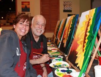 Couple with sunflowers