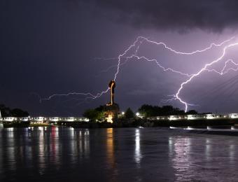 Keeper of the Plains at night with lightning