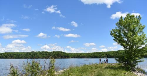 Couple fishing on the shore of Deam Lake State Recreation Area