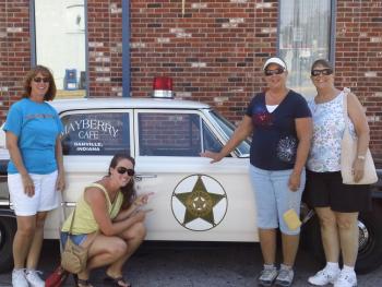 Visitors with Mayberry deputy car