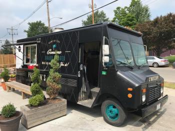 Preston's Burgers food truck - black truck with teal & white accents, logo, order window and menu