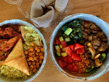 View of food bowls from Hoyo's Kitchen Somali restaurant in North Market
