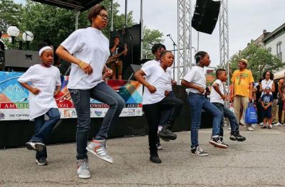 Children perform a dance routine at the African American Summer Festival in Ann Arbor