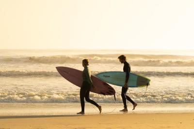 Couple with Suf Boards in Outer Banks