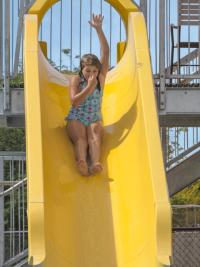 Girl going down water slide at Long Branch Lagoon