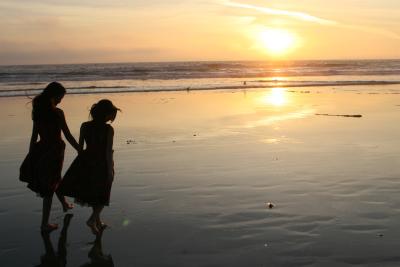 “The Golden Hour” right before sunset is a great time for beach photography, especially with a low tide exposing reflective wet sand. Photo courtesy of Alexandra Sloan
