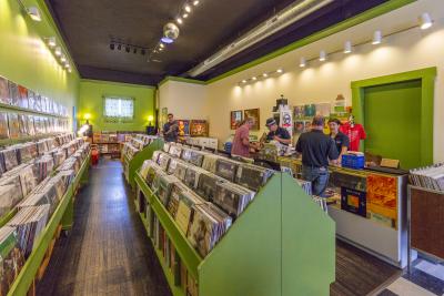View of vibrant interiors and aisles, shoppers at Spoonful Records