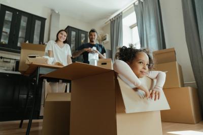 family with moving boxes