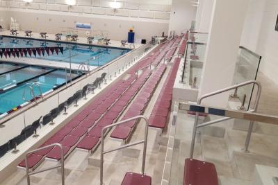 The Elite Seat Stadium Seating at an indoor pool by Southern Bleacher