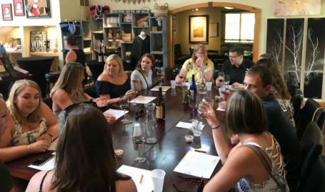 South Shore Brew Bus group around table at brewery