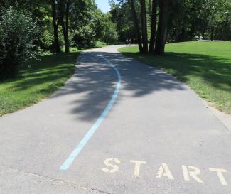 Trails are marked with start lines and mile markers.