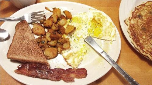 Plated eggs with toast and potatoes at Christopher’s Restaurant in Dayton, OH