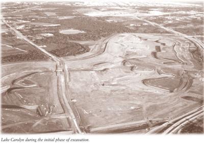 An old black & white aerial photo showing the construction of Lake Carolyn near Irving.