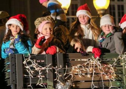 Kids enjoying the Wilmington Christmas parade 