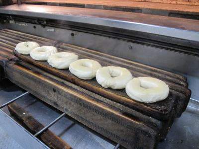 Fresh bagels in dough form ready to be prepared at Sammy's New York Bagels