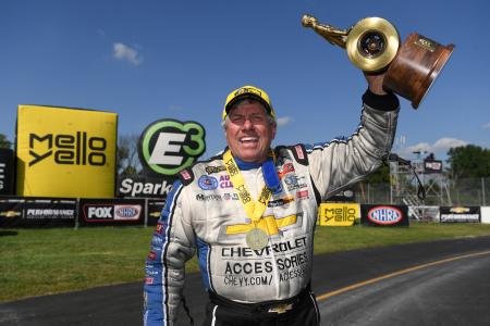 Funny Car driver John Force John Force winning trophy