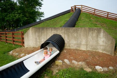 Kids sliding at Huber's Orchard